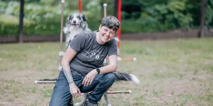 Brittni Hyzer - Certified Professional Dog Trainer with a dog